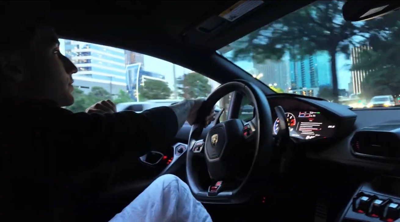 Coach driving downtown